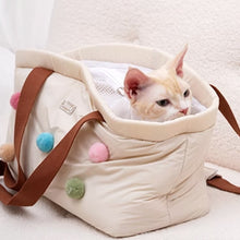 Load image into Gallery viewer, Cat Sitting Inside Arkika Pompom Cat Carrier | Pet Shoulder Bag | MissyMoMo