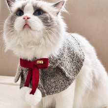 Load image into Gallery viewer, Colette Cat Bib in Grey on Ragdoll Cat | Red Bow and Pom Pom Cape | MissyMoMo
