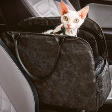 Load image into Gallery viewer, Cat Sitting in Black Leather Cat Car Seat Carrier | MissyMoMo
