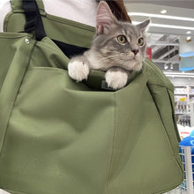 Load image into Gallery viewer, Cat Sitting In Green Cuddle Carrier Backpack Worn On Front | MissyMoMo
