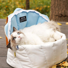 Load image into Gallery viewer, Relaxed Cat in Seashell Carrier Outdoors | MissyMoMo
