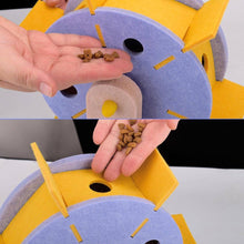 Load image into Gallery viewer, Hand Loading Kibble Into the Windmill Cat Toy Wheel | Cat Puzzle Feeders | MissyMoMo
